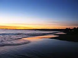 Sunset at Seacliff State Beach in Aptos, California.