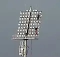Workers working on a light in the ground