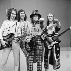 Slade in 1973. Left to right: Jim Lea, Don Powell, Noddy Holder, Dave Hill