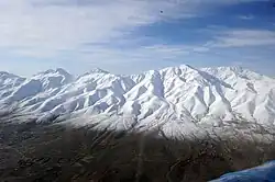 Snow-covered mountains in Ghazni province
