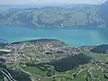 Spiez from the air, with the lake in the background and the Kander bottom left