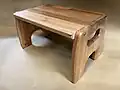 Finger-jointed Eucalyptus robusta was reused from a shipping pallet for use in this step stool.