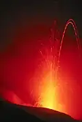 Stromboli eruption. The yellow/reddish things in the picture are lava.