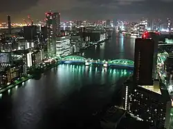 The Kachidoki-bashi lit at night.