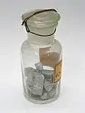 Tellurium in a bottle. Tellurium sometimes is found naturally.