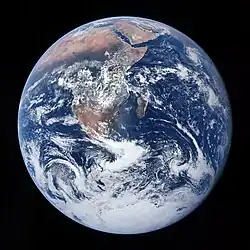 Photograph of Earth taken by the Apollo 17 mission. The Arabian peninsula, Africa and Madagascar lie in the upper half of the disc, whereas Antarctica is at the bottom.