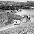 A British 17-pounder anti-tank gun&nbsp;[en] towed behind Half-track&nbsp;[en] in Italy, 1 September 1944.