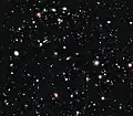 XDF (2012) view - each light speck is a galaxy - some of these are as old as 13.2 billion years - the universe is estimated to contain 200 billion galaxies.