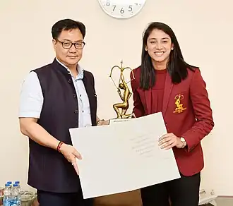 The_Minister_of_State_for_Youth_Affairs_&_Sports_(Independent_Charge)_and_Minority_Affairs,_Shri_Kiren_Rijiju_conferring_the_Arjun_Award_to_Ms._Smriti_Mandhana_(Cricket),_in_New_Delhi_on_July_16,_2019