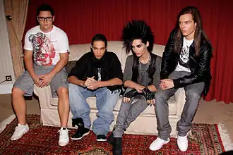 Tokio Hotel in 2009. L-R: Gustav Schäfer, Tom Kaulitz, Bill Kaulitz, and Georg Listing