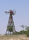 Double wind wheel and common Aermotor wind wheel in Texas