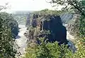 Victoria Falls gorge with Victoria Falls Bridge in background