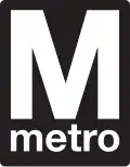 Black and white Washington Metro logo with a big white M above smaller white letters spelling Metro