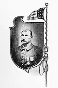 Portrait of a white man with a mustache and thinning hair, wearing a jacket with two medals pinned to the left breast. The portrait is in a shield-shaped frame next to a sketch of an American flag.