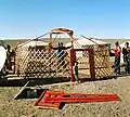 Mongolian Ger: starting to place roof poles