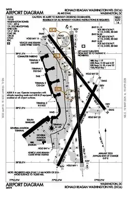 A map with a grid overlay showing the terminals runways and other structures of the airport.